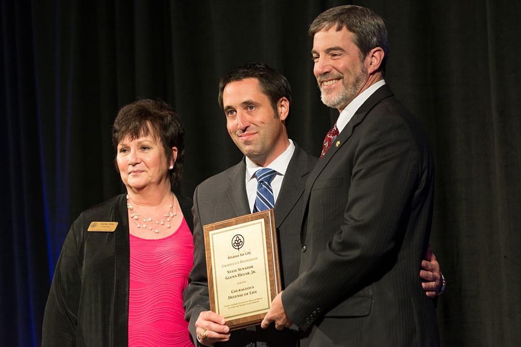 Joe Pojman and Davida Stike awarding Senator Hegar the Courageous Defense of Life award